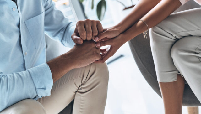 Mental health support, holding hands